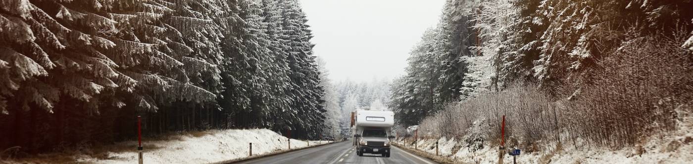 rv driving on winter road